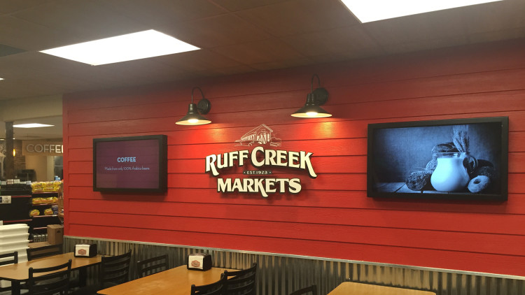 Ruff Creek travel center interior with custom dimensional signage and displays