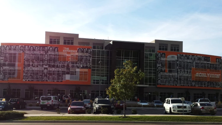 Storefront window graphics installed on a row of retail windows in Utah